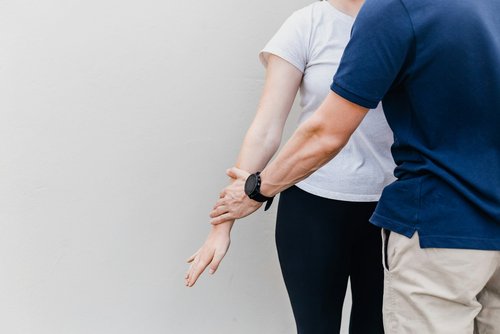 Physiotherapist treating a female patient